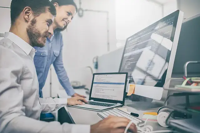 Digital marketing specialists collaborating on Google Shopping Ads management, working on campaign optimisation, product feed setup, and performance tracking to improve ecommerce visibility and return on ad spend. Ideal for illustrating Google Ads Shoppin
