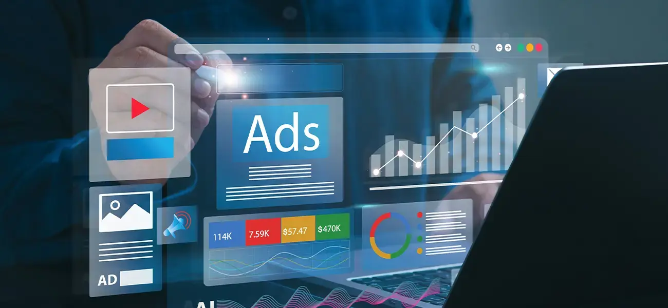 Laptop displaying Google Ads analytics dashboard with charts and graphs showing campaign performance metrics.