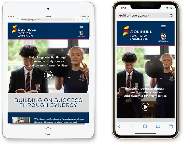 Responsive website design example of solihullsynergy.co.uk on tablet and mobile devices, showcasing a school fundraising campaign with a video hero section, bold branding, and clear messaging on educational and fitness development.