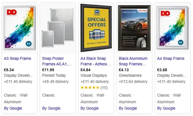 Google Shopping results for snap frames, displaying a range of wall-mounted aluminium poster frames in various sizes (A3, A4, A0) from retailers like Display Developments, Printed Today, and Greenbarnes. Listings feature product prices, delivery costs, an