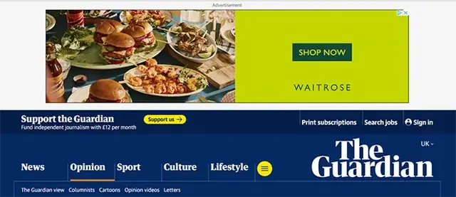 Screenshot of The Guardian website featuring a Google Display Network banner ad from Waitrose with the message “Shop Now” alongside images of burgers and party food—illustrating real-world display advertising in a premium news media environment.