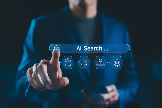 Business professional using an AI search interface that combines chatbots, data and global results, representing modern AI-powered search.