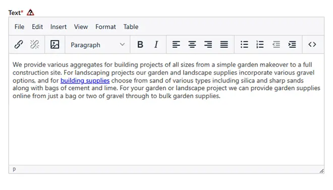 Screenshot of a rich text editor displaying marketing copy about aggregates, garden, and landscape supplies, used for copywriting and content entry on a services website.